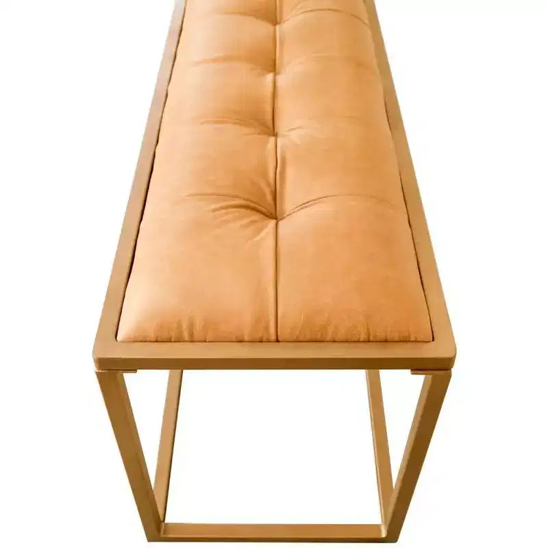 Banc de chambre tapissé marron et or